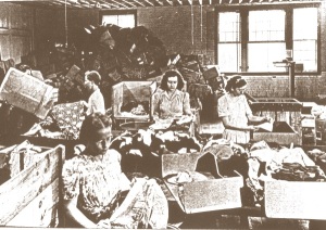Women sort relief clothing to be sent to Europe. Photo courtesy of Brethren Historical Library and Archives.